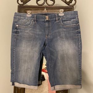 Denim shorts by White House Black Market. Knee length, coffee hem.